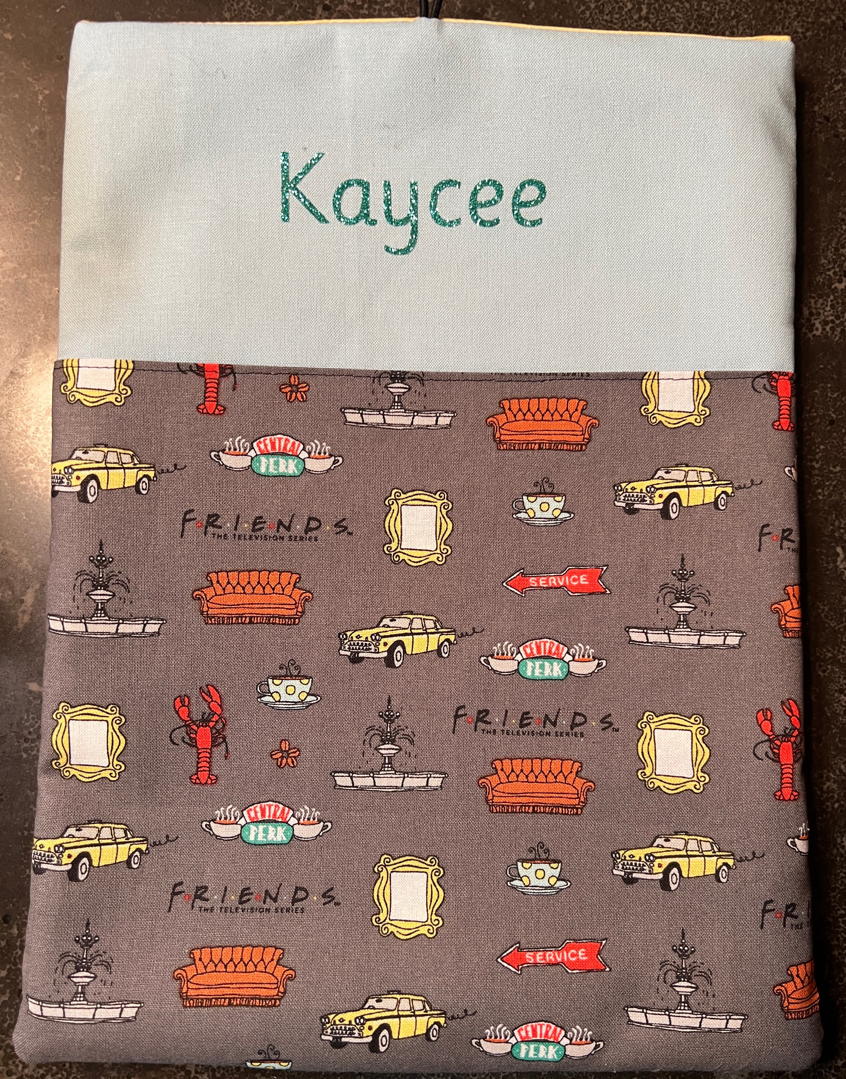 A handmade Pocket Pal sleeve with Chiefs fabric
